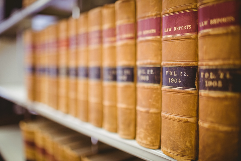 a closeup shot of law books on a shelf for a texas injury law blog post